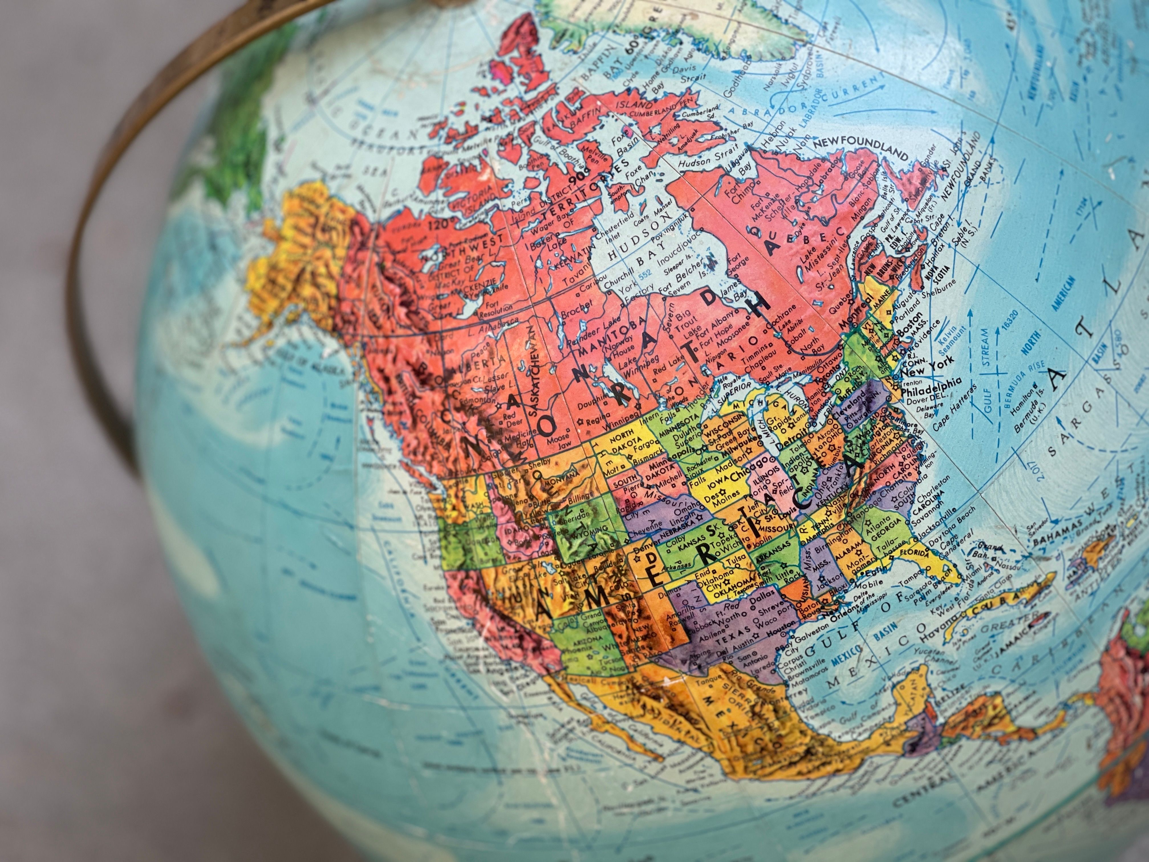 A colorful world map with country flags